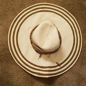 White and tan beaded sun hat. One size fit all